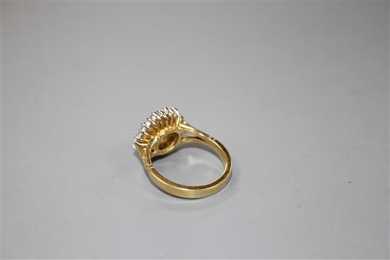 A modern 18ct gold and diamond cluster dress ring,